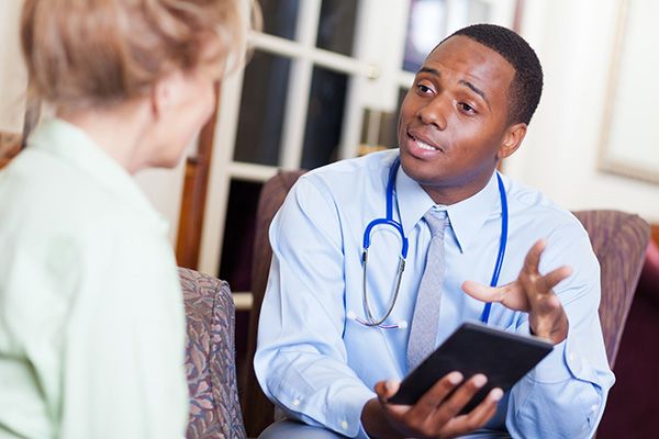 A doctor advising a patient
